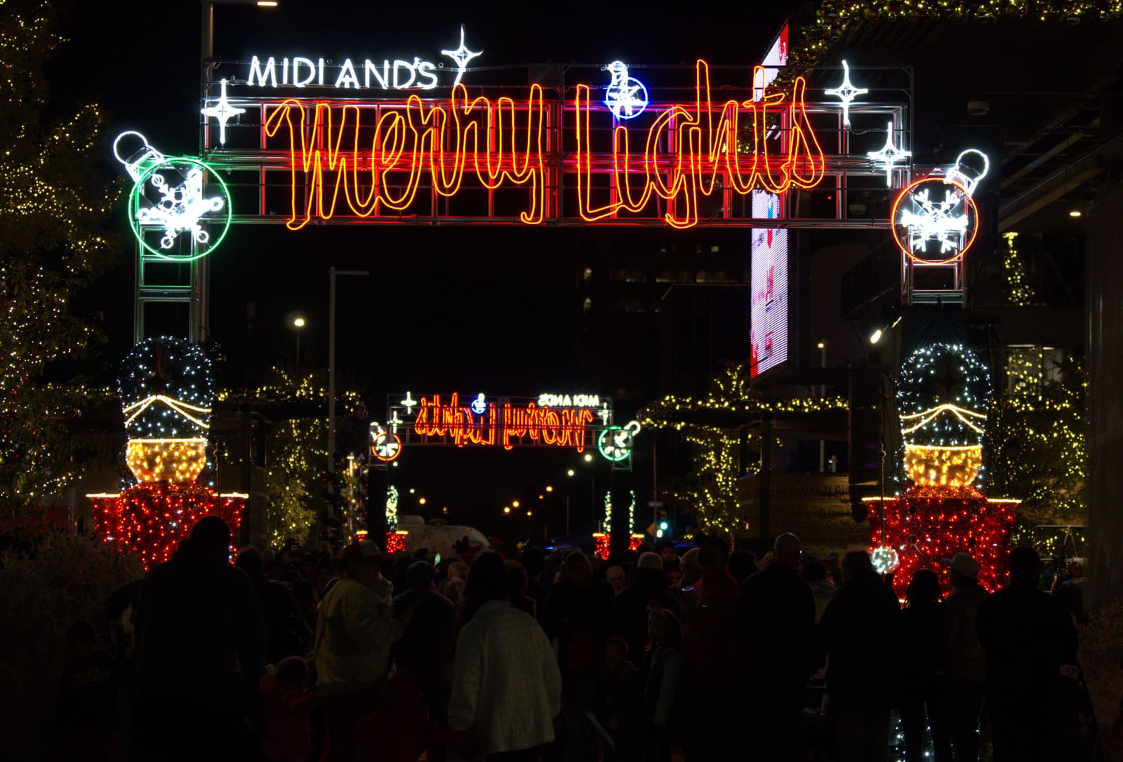 Downtown Midland glowing with holiday lights at night