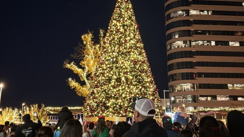 Families enjoying holiday activities at Midland's Merry Lights